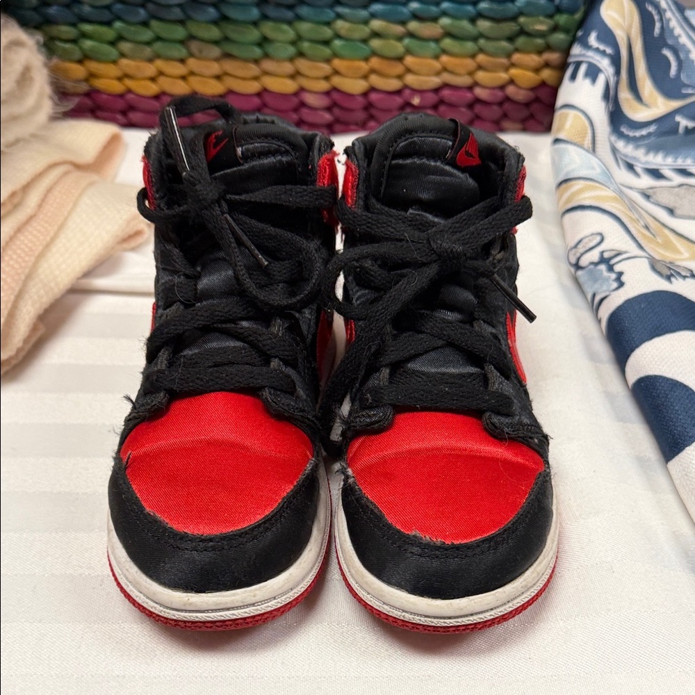 Kids Red and Black Nike Sneakers